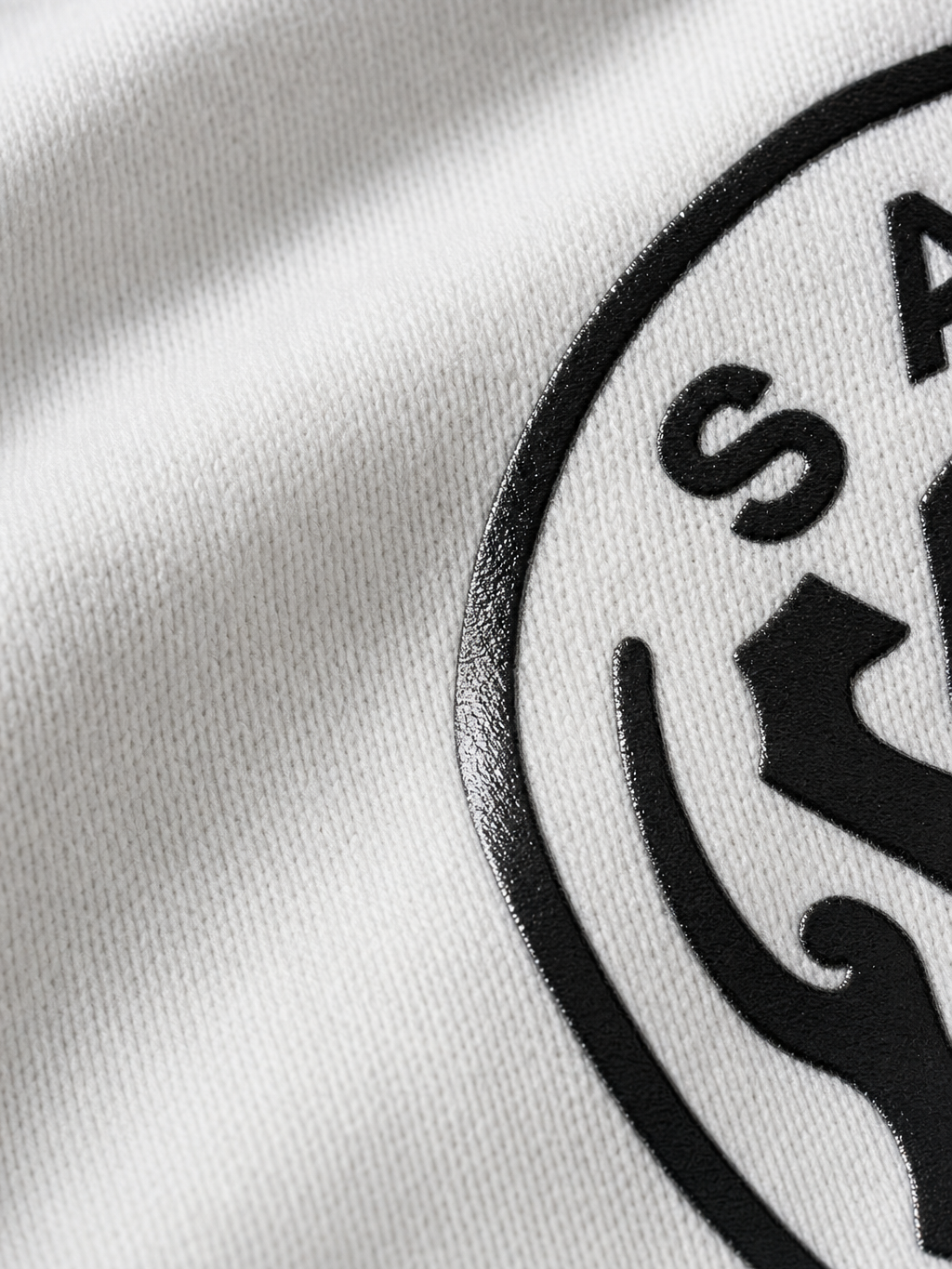 Saints Be Autyst Quarter Zip White T-Shirt – close-up detail