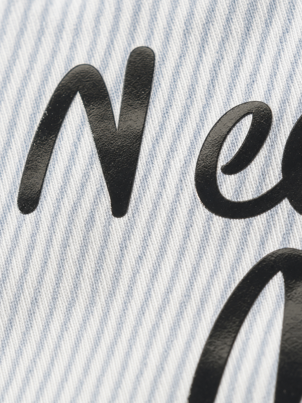 Need Money Be Autyst Blue Striped Shirt – close-up detail