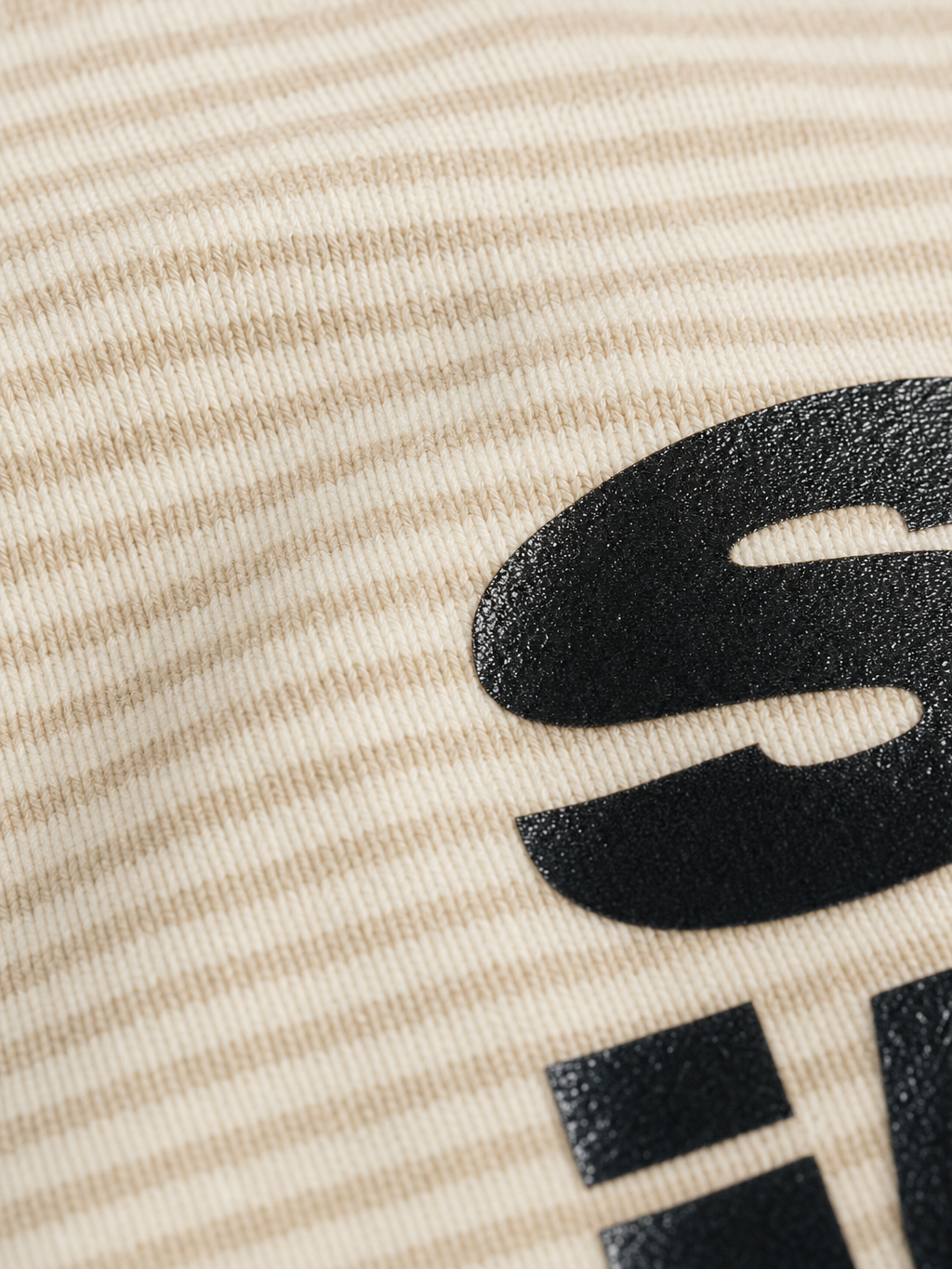 She Mad Be Autyst Beige Striped Shirt – close-up detail